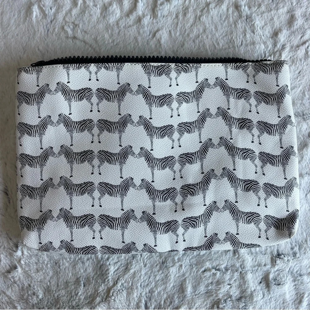 Nila Anthony Zebra Print Clutch.